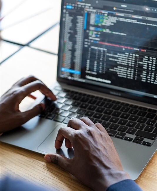 Trainee writing code